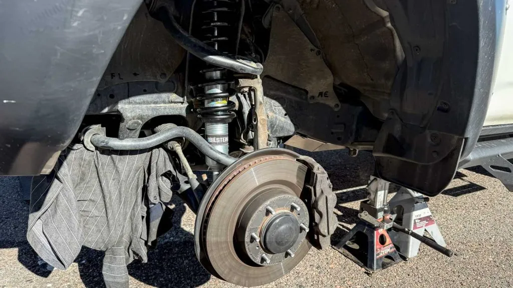bilstein front suspension being installed on toyota 4runner