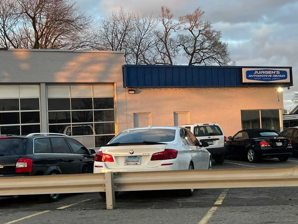 bmw that was overheating parked at a repair shop in michigan